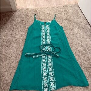 Green Sleeveless Dress with White Embroidery